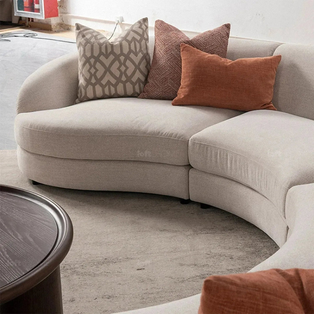 Cream fabric modular armless 1 seater sofa groove in still life.