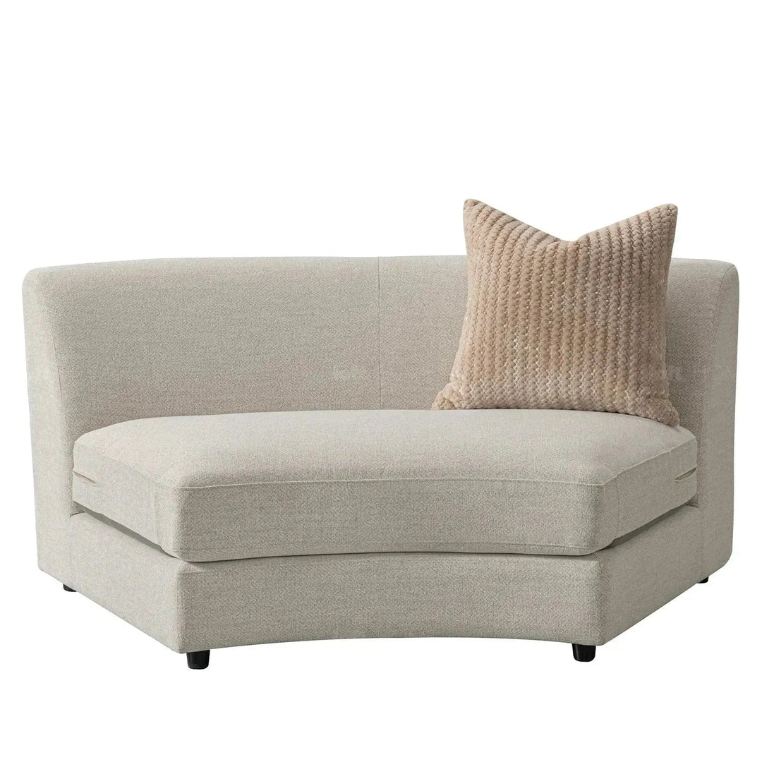 Cream fabric modular armless 1 seater sofa groove in close up details.