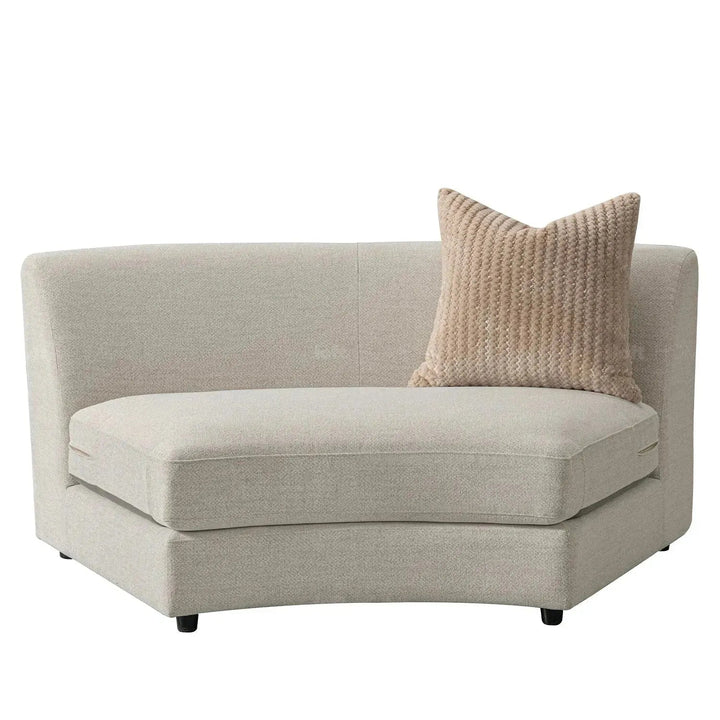Cream fabric modular armless 1 seater sofa groove in close up details.