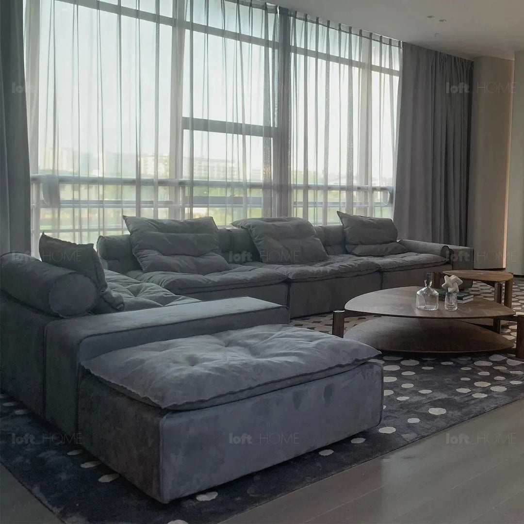 Modern fabric modular ottoman woolen in close up details.