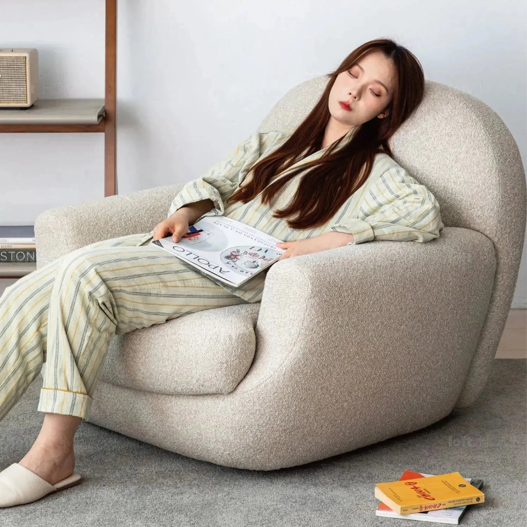 Cream faux cashmere fabric revolving 1 seater sofa rond environmental situation.