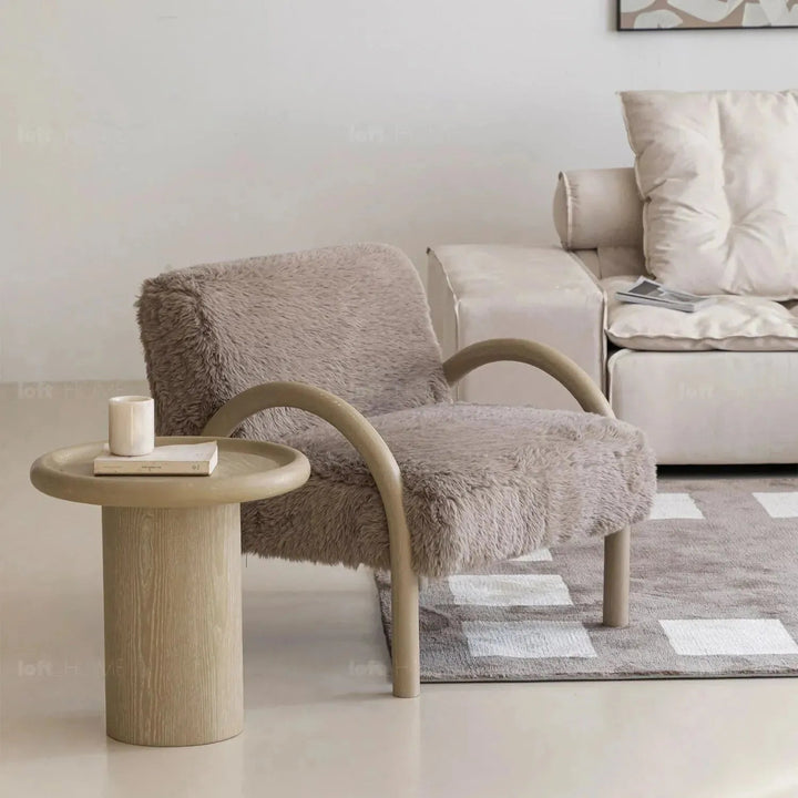 Cream sherpa fabric 1 seater sofa shearling layered structure.