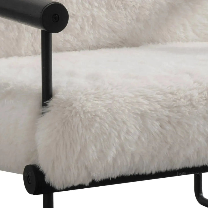 Cream sherpa fabric 1 seater sofa snowy in still life.