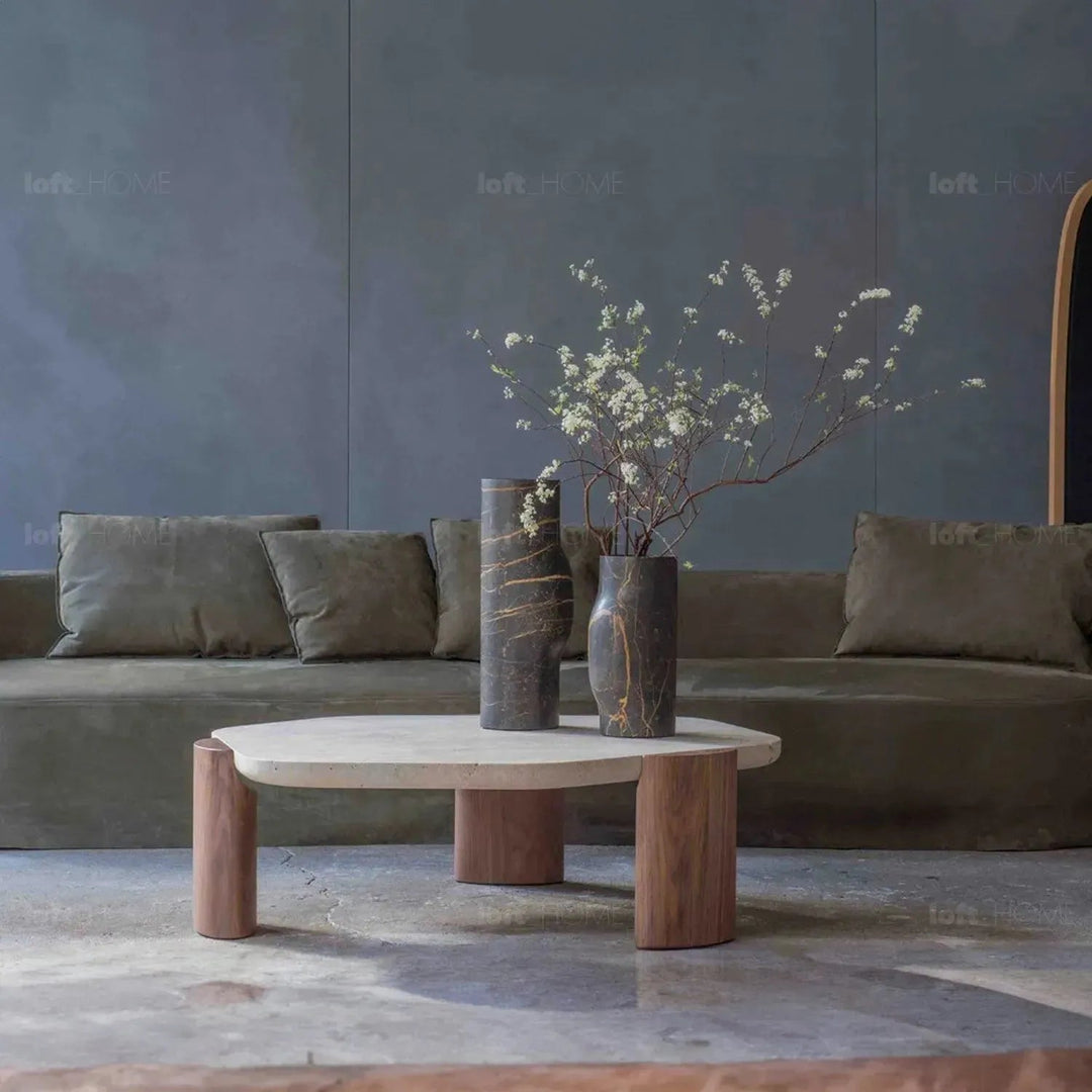 Scandinavian travertine stone coffee table trawo with context.
