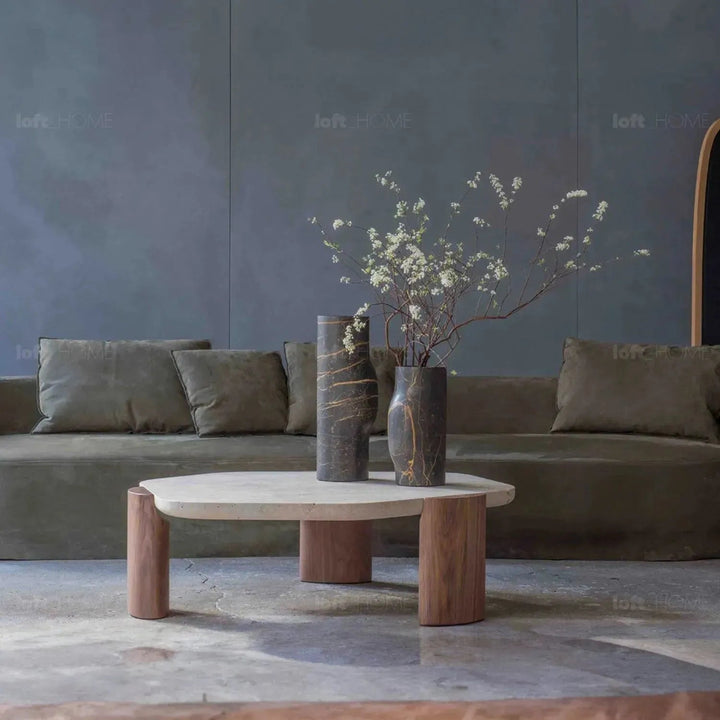 Scandinavian travertine stone coffee table trawo with context.