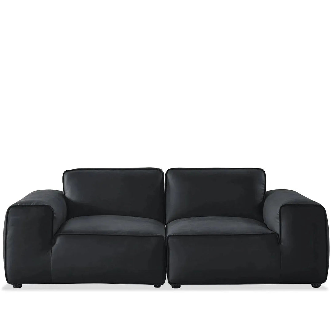 Minimalist microfiber leather 3 seater sofa fleece in white background.