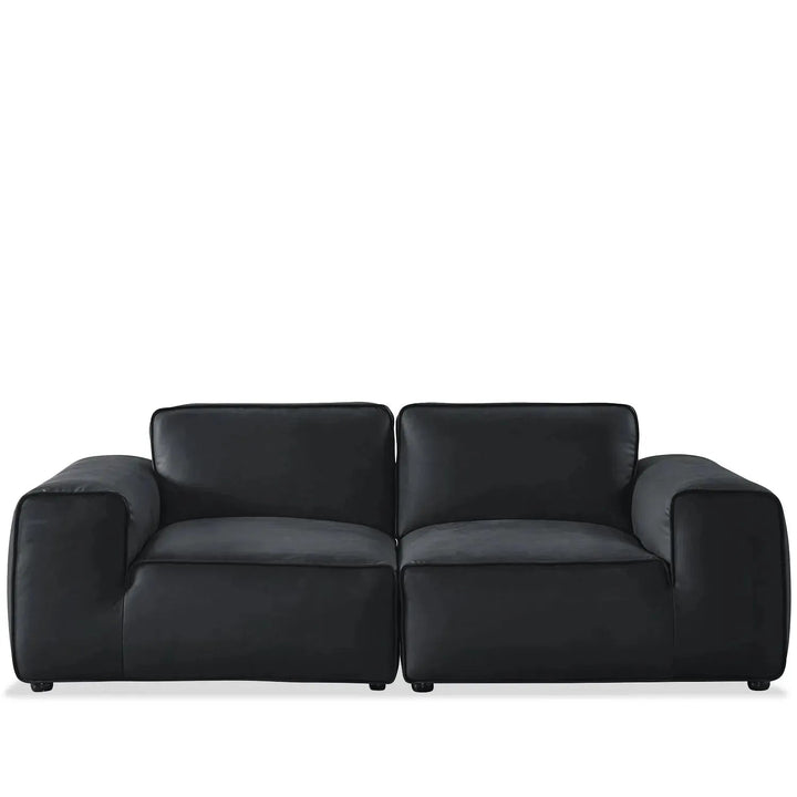 Minimalist microfiber leather 3 seater sofa fleece in white background.