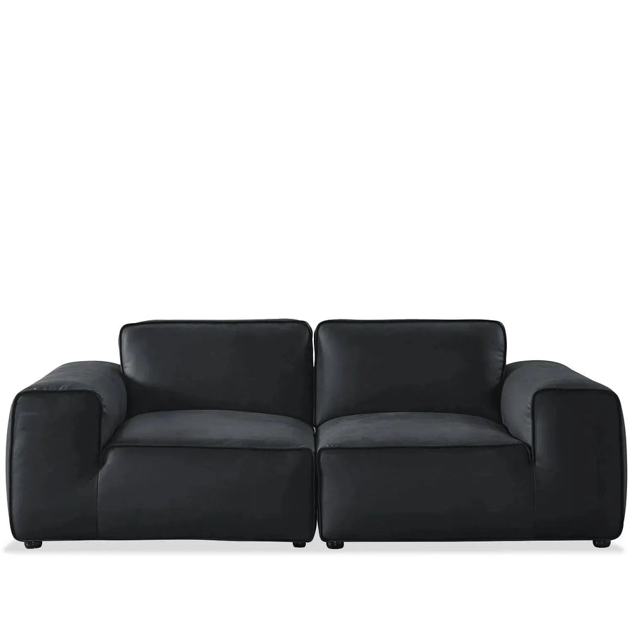 Minimalist microfiber leather 3 seater sofa fleece in white background.