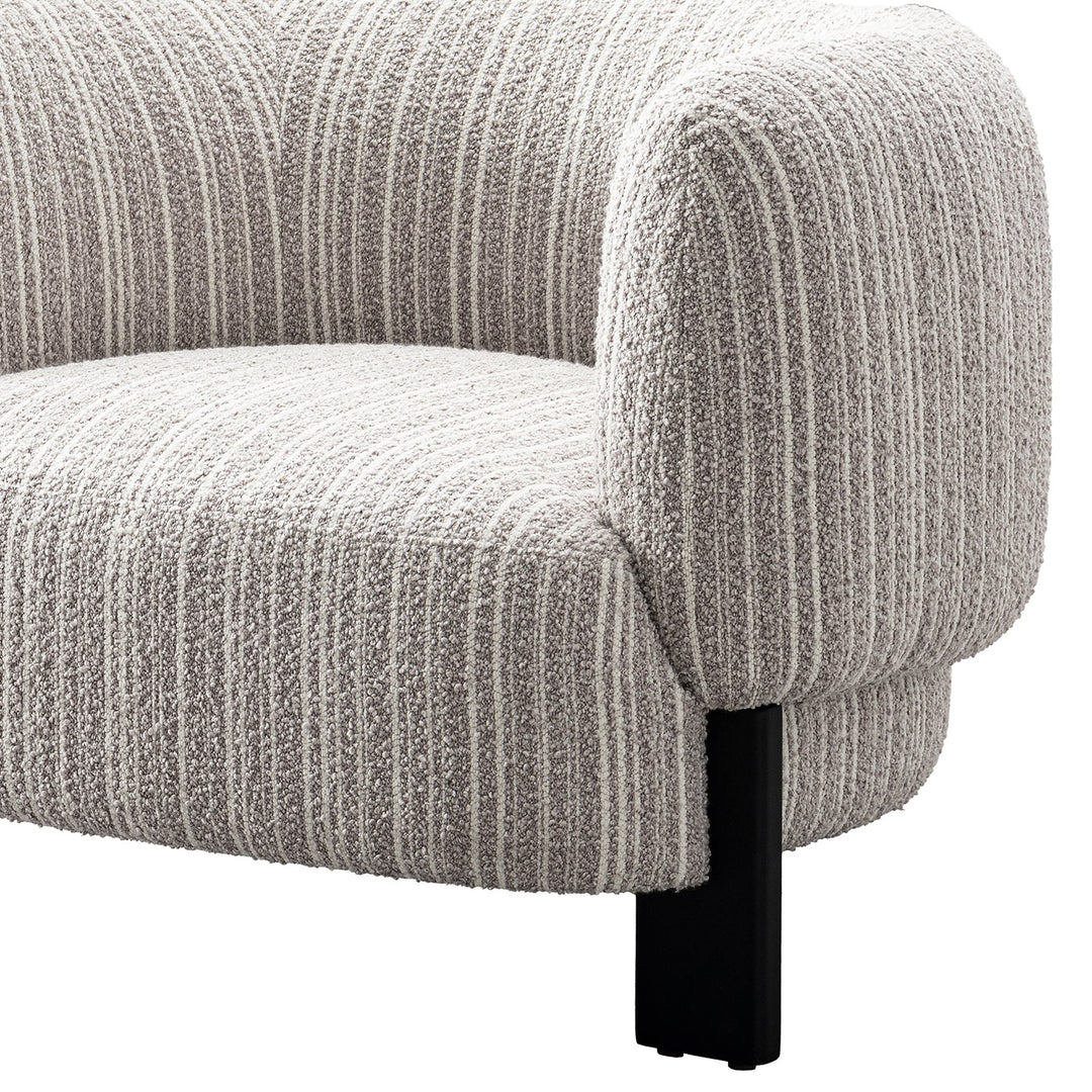 Japandi mixed weave fabric 1 seater sofa embrace in close up details.