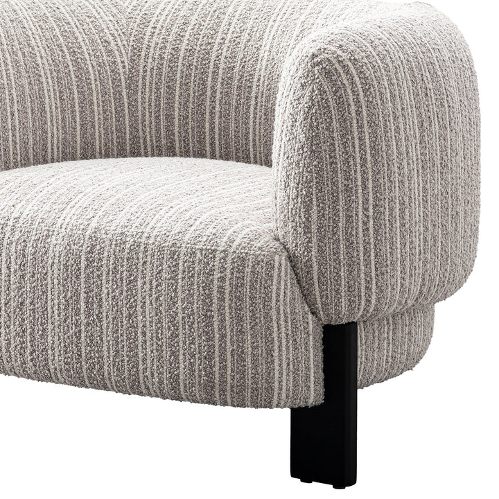 Japandi mixed weave fabric 1 seater sofa embrace in close up details.