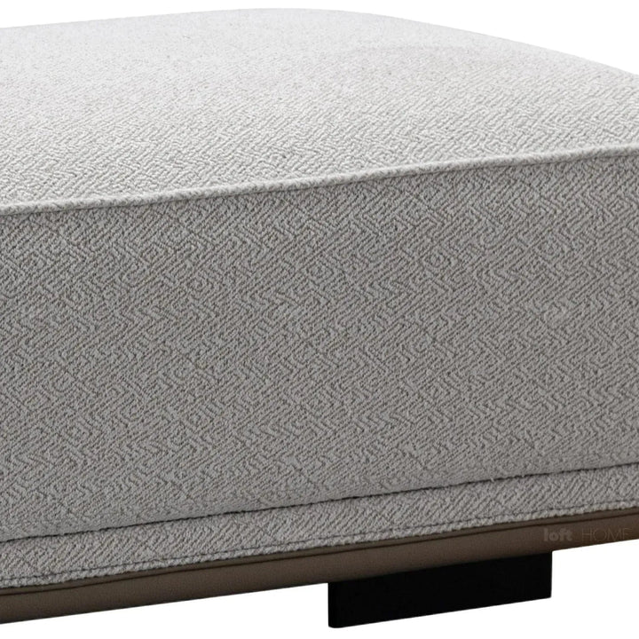 Minimalist mixed weave fabric modular ottoman eleganza l in real life style.