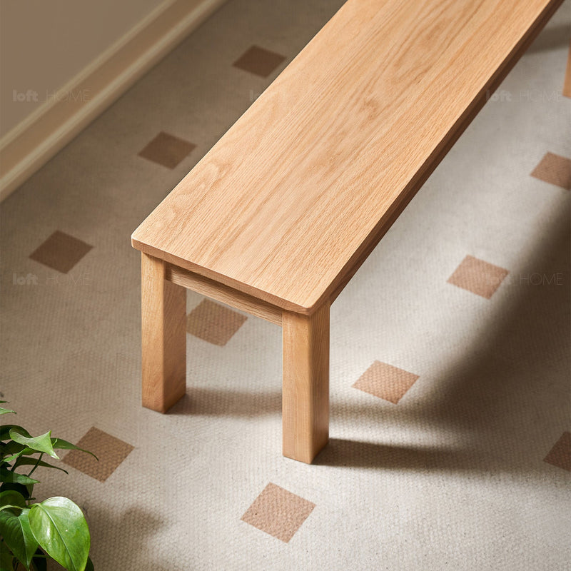 Scandinavian oak wood dining bench ligna in close up details.