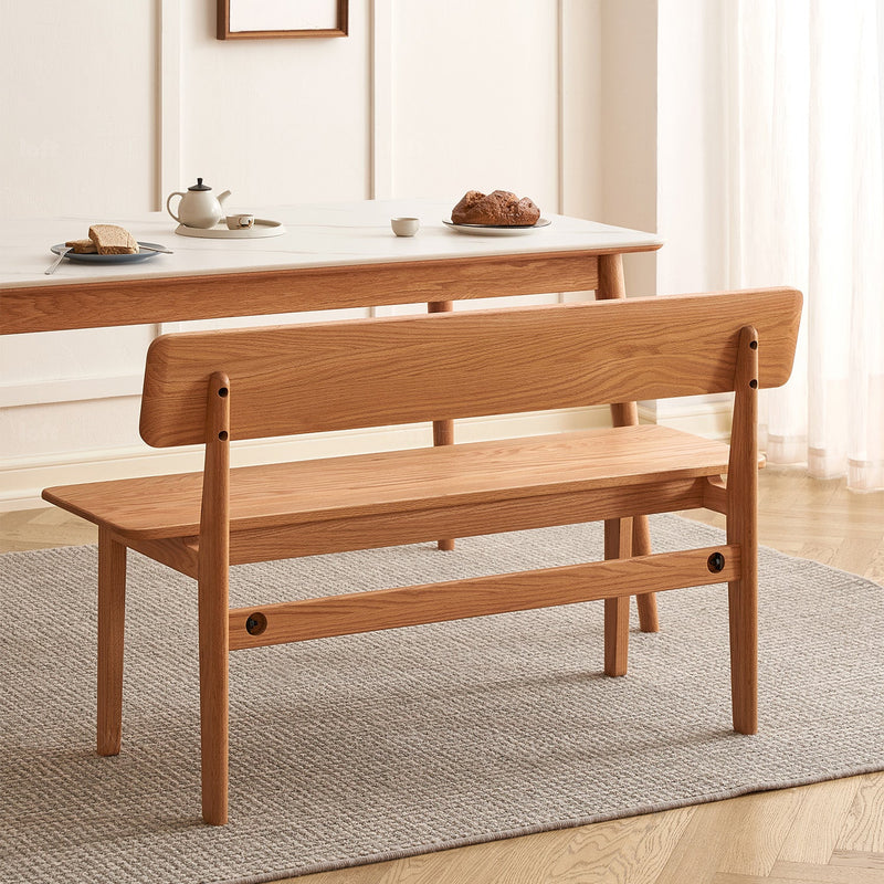 Scandinavian oak wood dining bench with backrest restly in details.