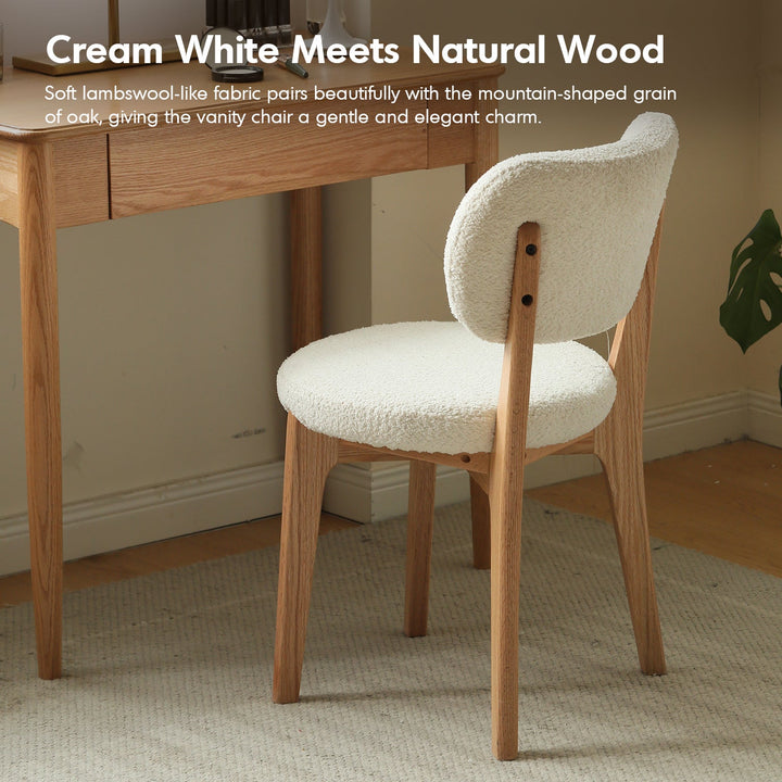 Scandinavian oak wood boucle fabric cover removable dining chair cloud with context.