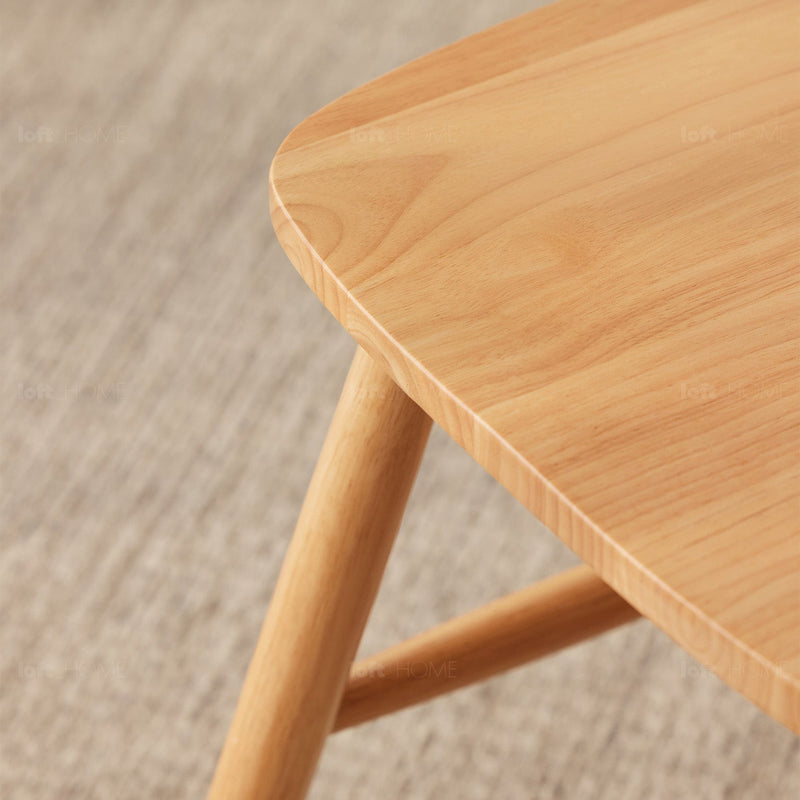 Scandinavian rubber wood dining chair windsor in close up details.