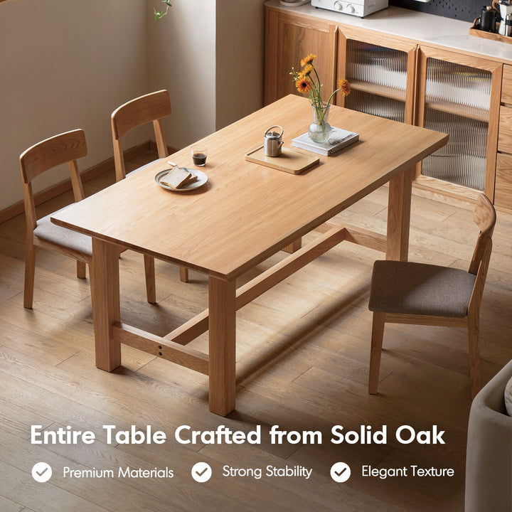 Scandinavian oak wood dining table haven in close up details.