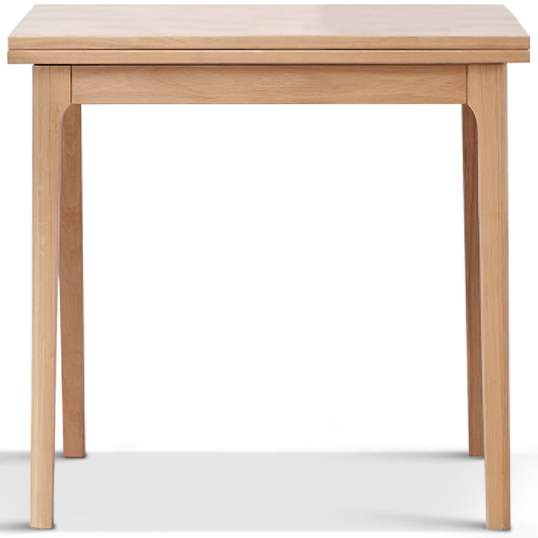 Scandinavian oak wood extendable dining table privot in white background.