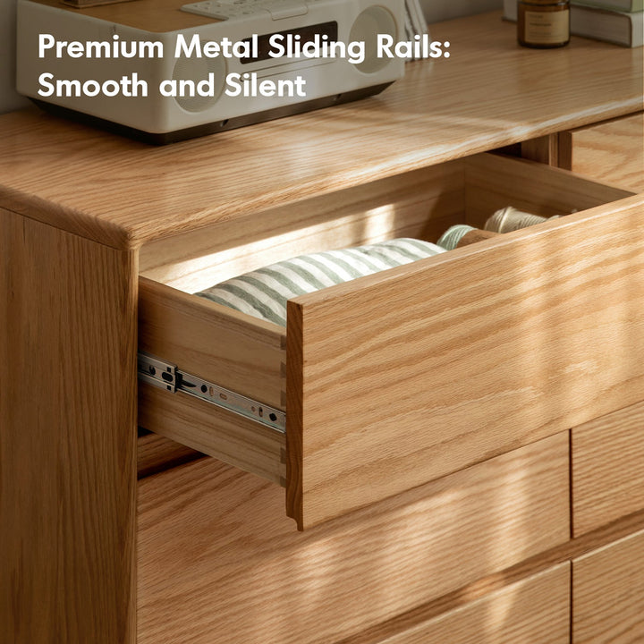 Scandinavian oak wood extendable dressing table with chest of drawers vista in close up details.