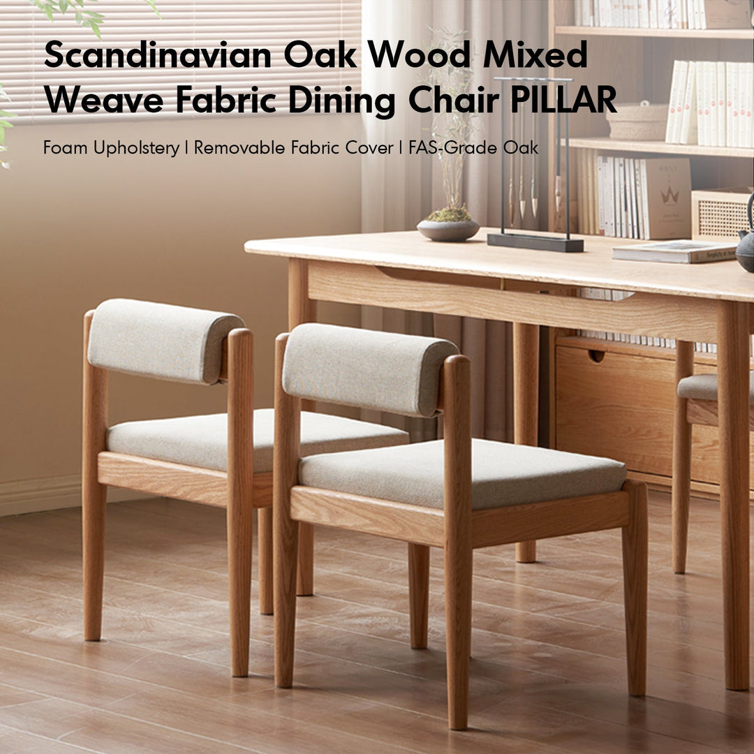 Scandinavian oak wood mixed weave fabric dining chair pillar with context.