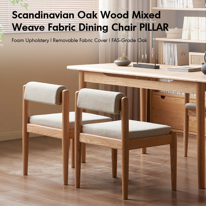 Scandinavian oak wood mixed weave fabric dining chair pillar with context.