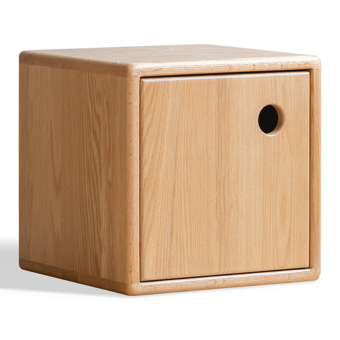 Scandinavian oak wood modular storage cabinet dice in still life.