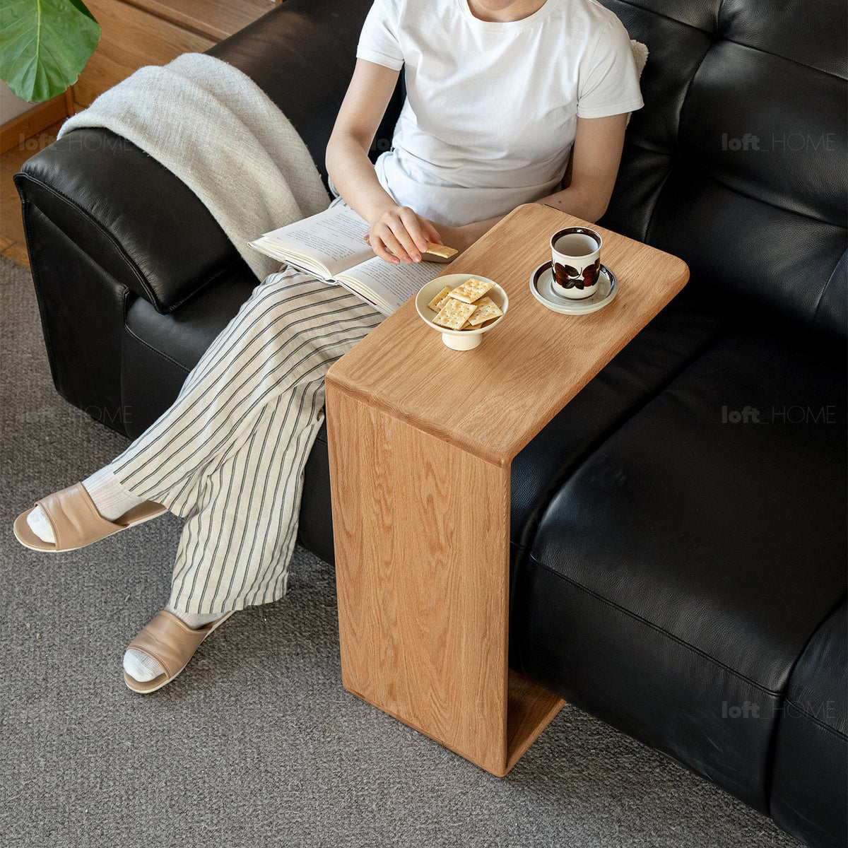Scandinavian oak wood multi functional side table cshape with context.