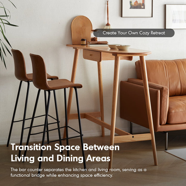 Scandinavian oak wood oval bar table arc with context.