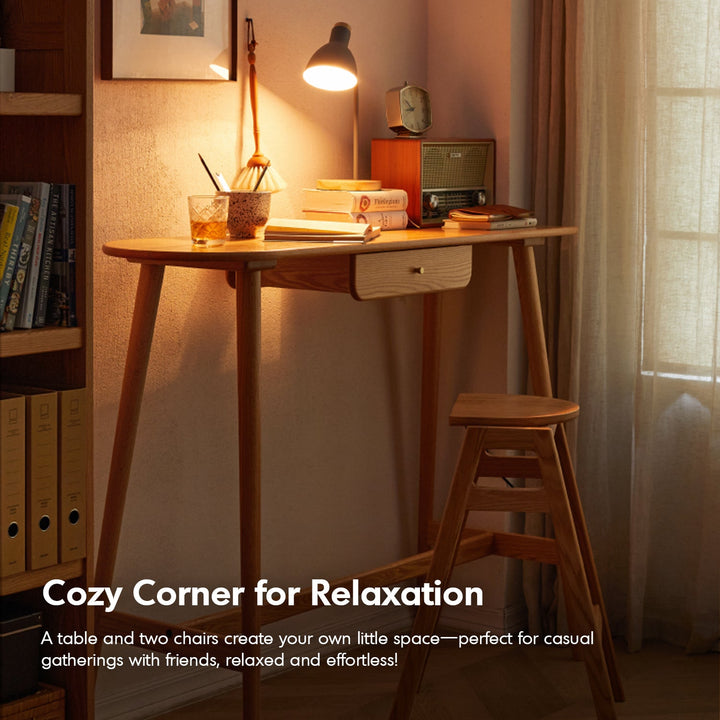 Scandinavian oak wood oval bar table arc in close up details.