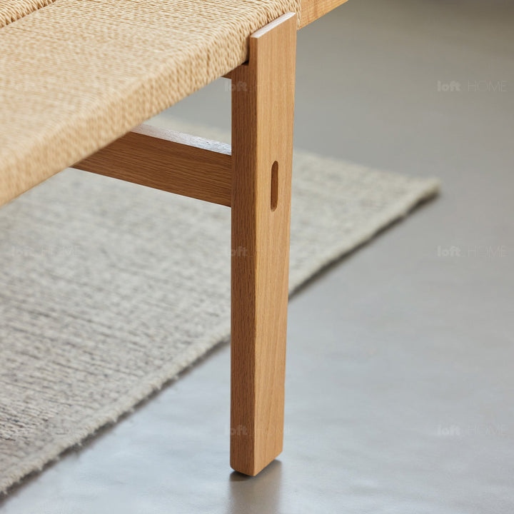 Scandinavian oak wood woven rope dining bench ora in panoramic view.