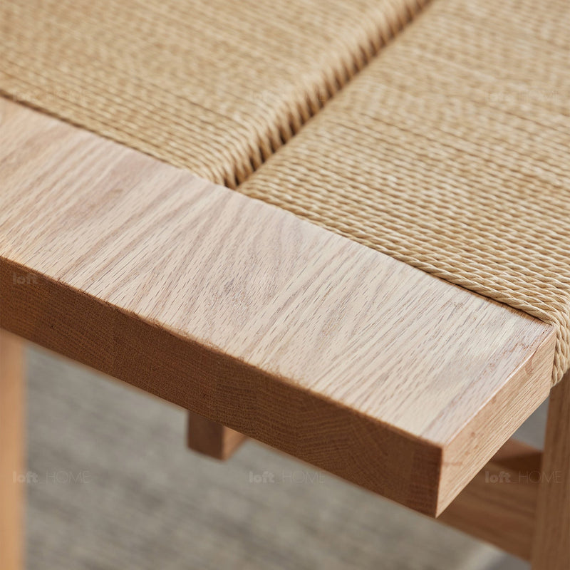 Scandinavian oak wood woven rope dining bench ora in close up details.