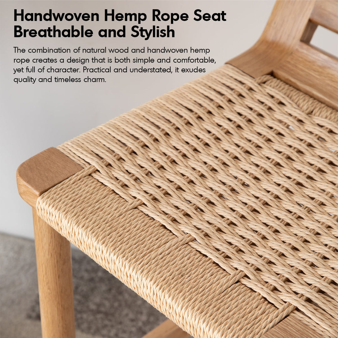 Scandinavian oak wood woven rope bar chair ora with context.