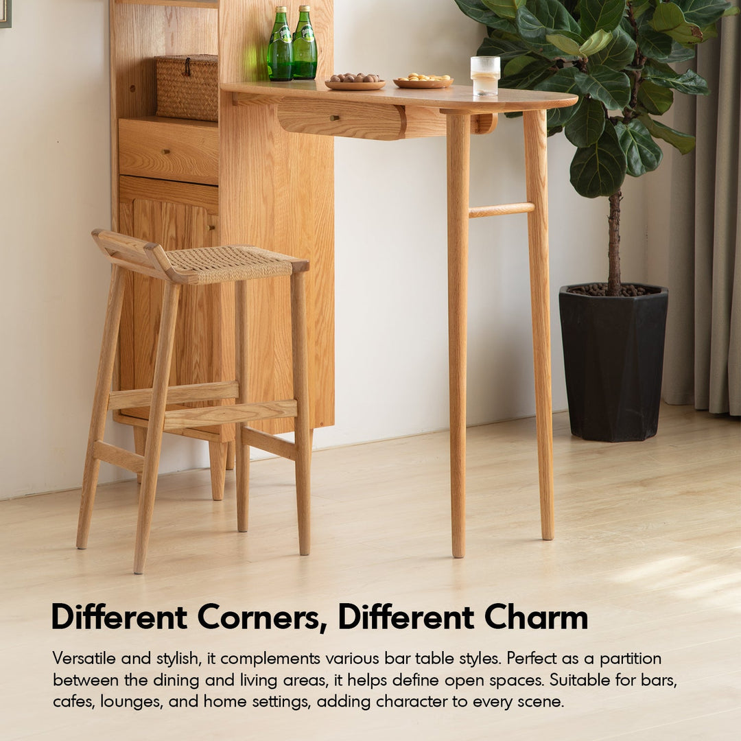 Scandinavian oak wood woven rope bar chair ora in close up details.