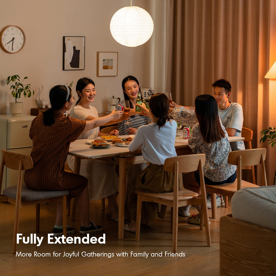 Scandinavian oak wood sintered stone extendable dining table flex in panoramic view.