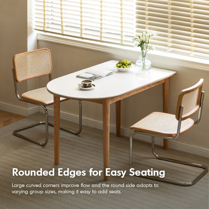 Scandinavian oak wood sintered stone half oval dining table halo in close up details.