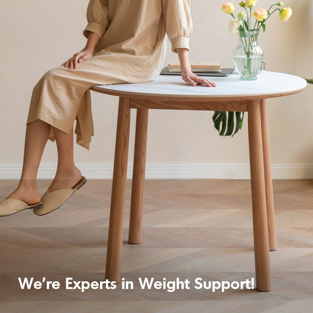 Scandinavian oak wood sintered stone round dining table orb situational feels.