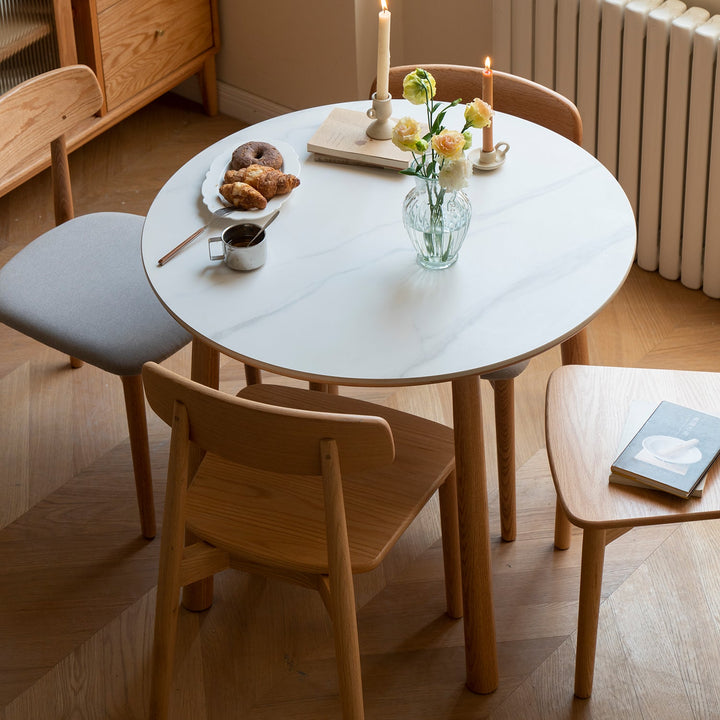 Scandinavian oak wood sintered stone round dining table orb detail 9.