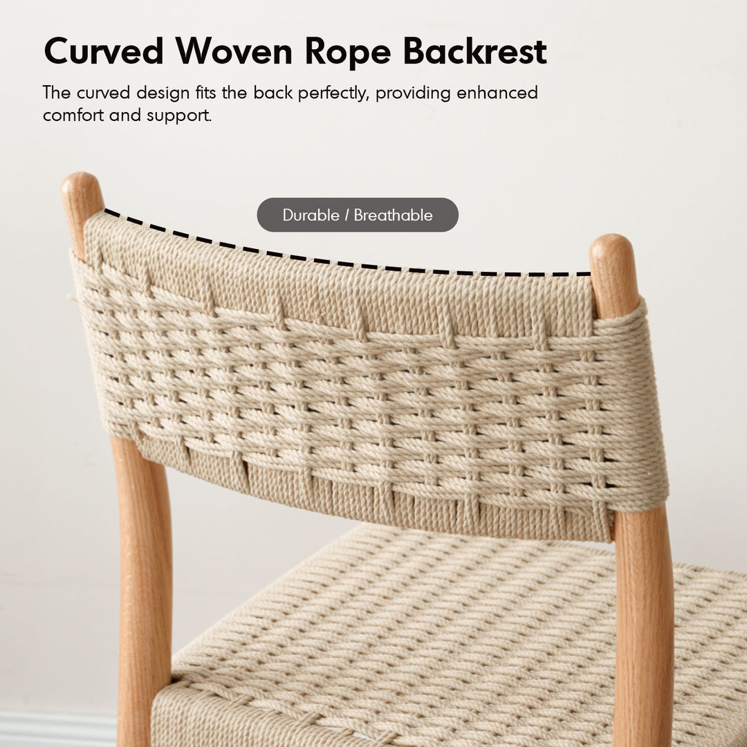 Scandinavian oak wood woven rope dining chair weave in panoramic view.