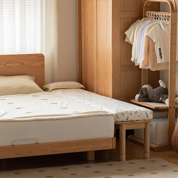Scandinavian poplar wood extended splicing bed frame with mattress sela situational feels.