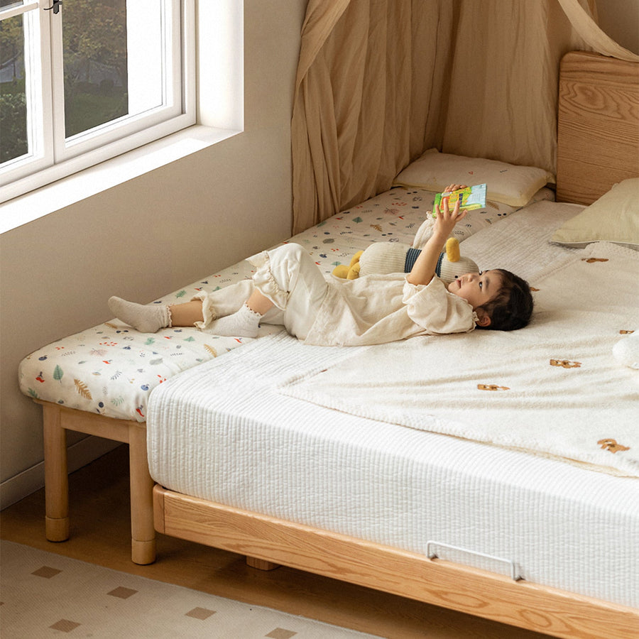 Scandinavian poplar wood extended splicing bed frame with mattress sela primary product view.