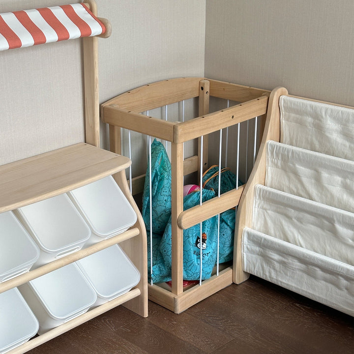 Scandinavian poplar wood storage basket luka in panoramic view.