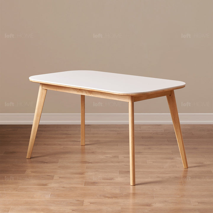Scandinavian rubber wood sintered stone dining table terra with context.