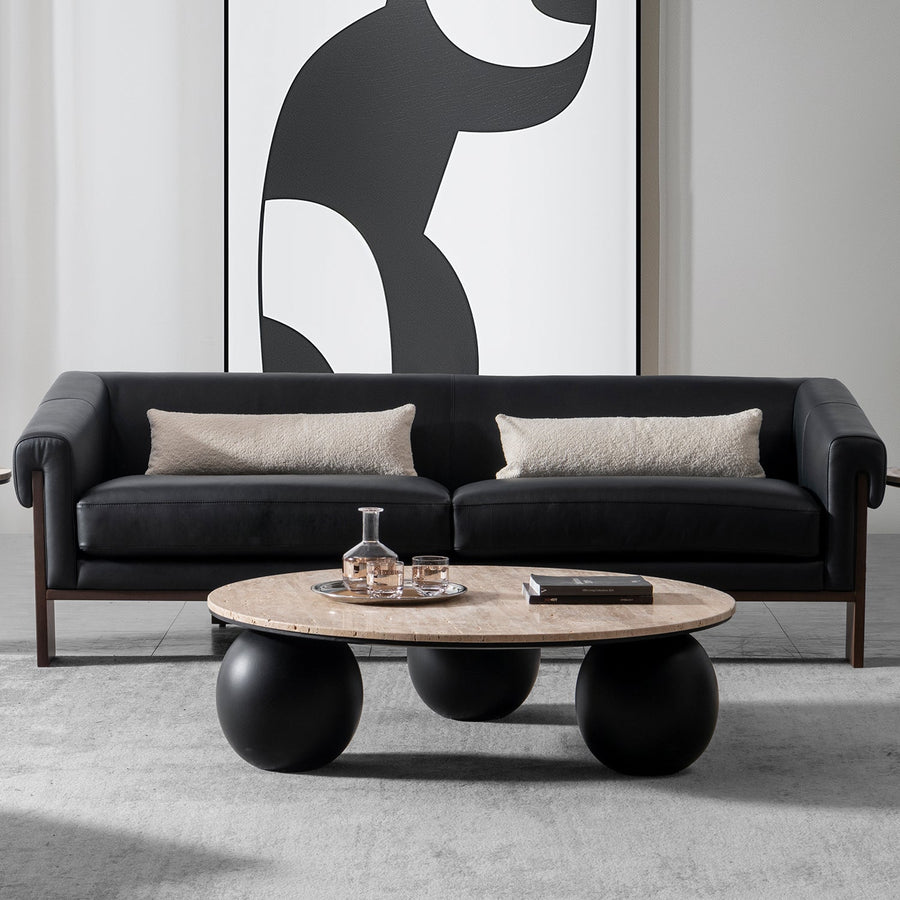 Japandi travertine stone coffee table muckety primary product view.