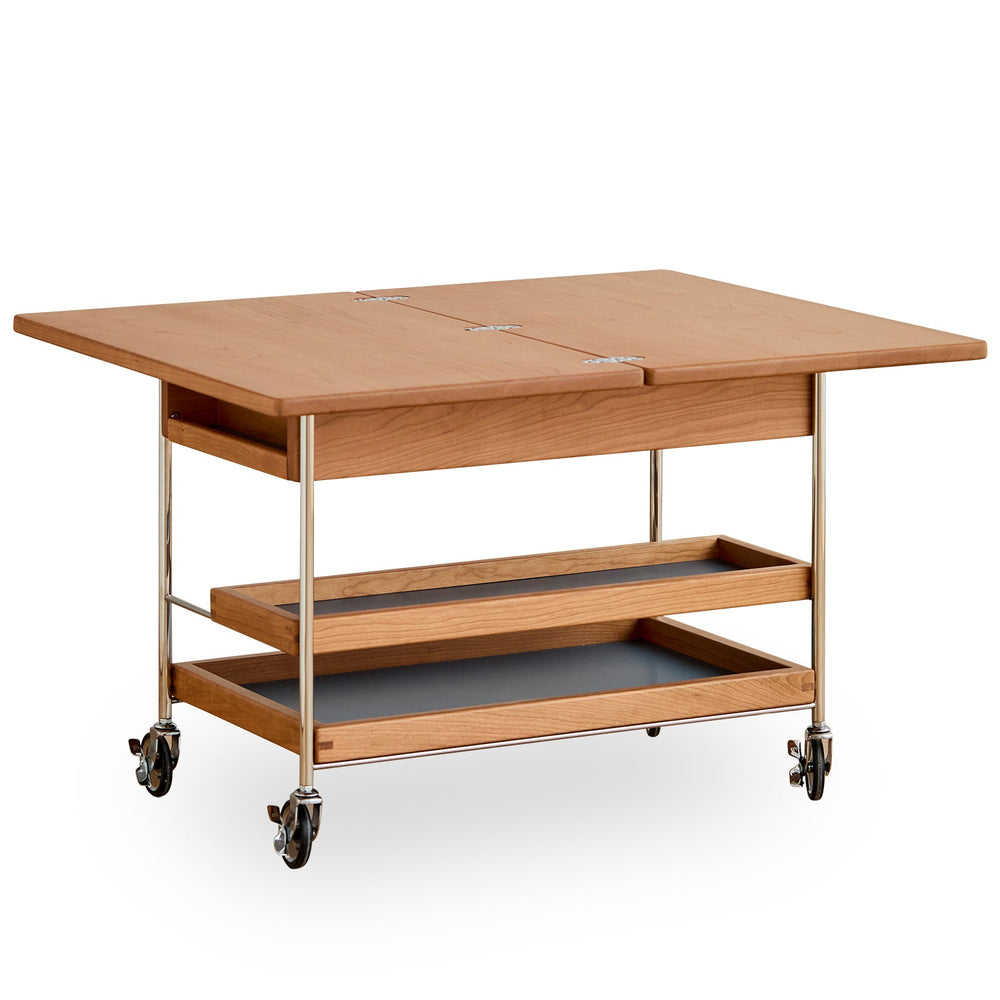Scandinavian cherry wood extendable coffee table timeless in white background.
