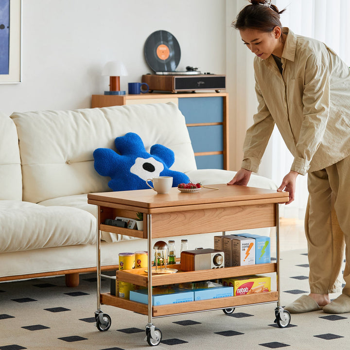 Scandinavian cherry wood extendable coffee table timeless in close up details.