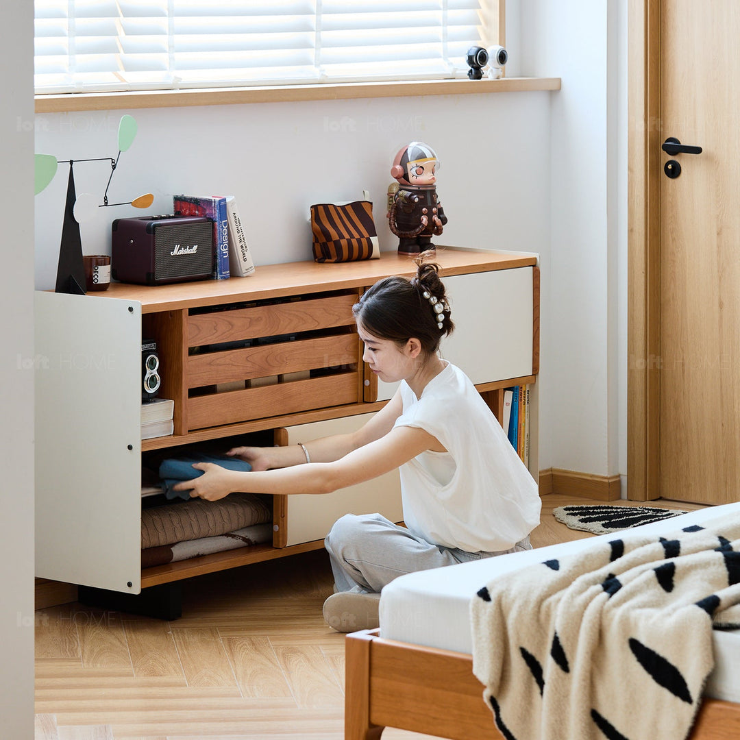 Scandinavian cherry wood side cabinet timeless with context.
