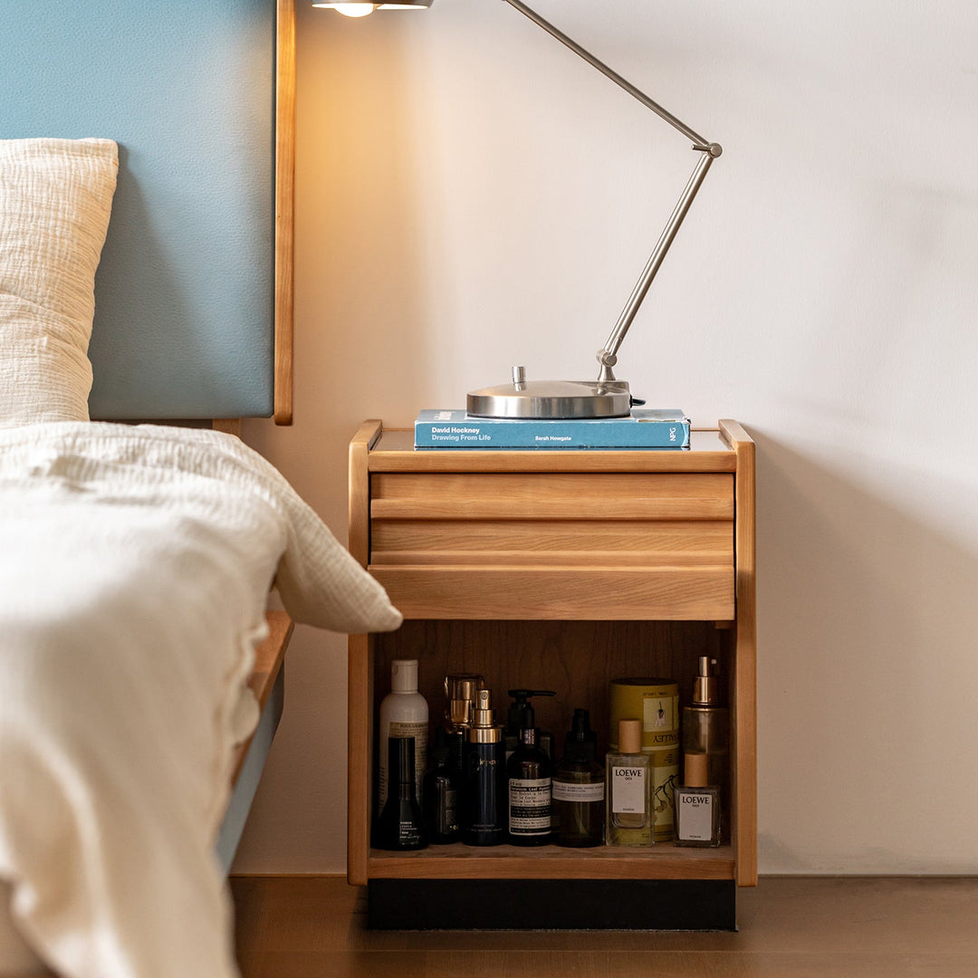 Scandinavian cherry wood side table timeless in close up details.
