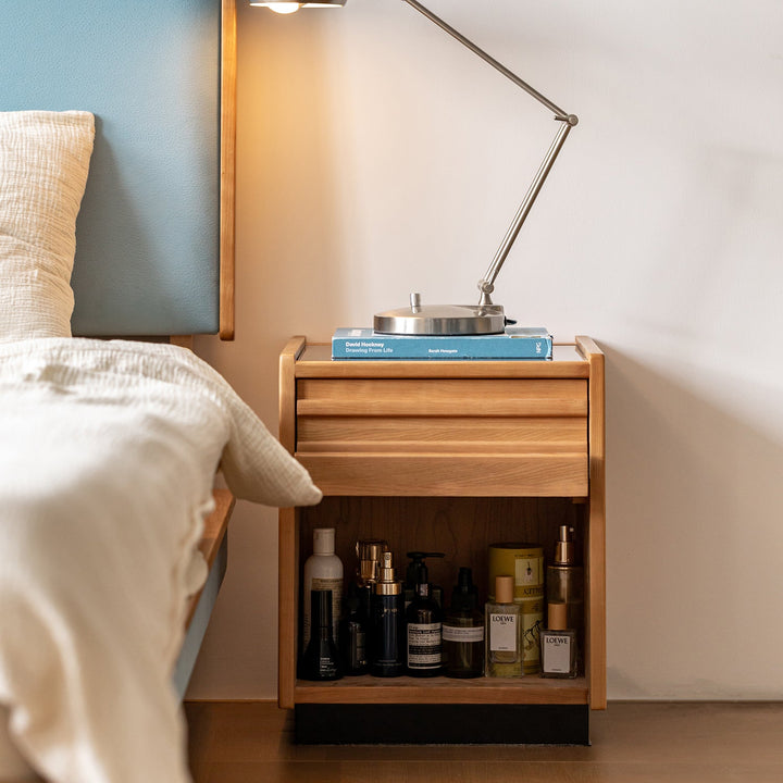 Scandinavian cherry wood side table timeless in close up details.