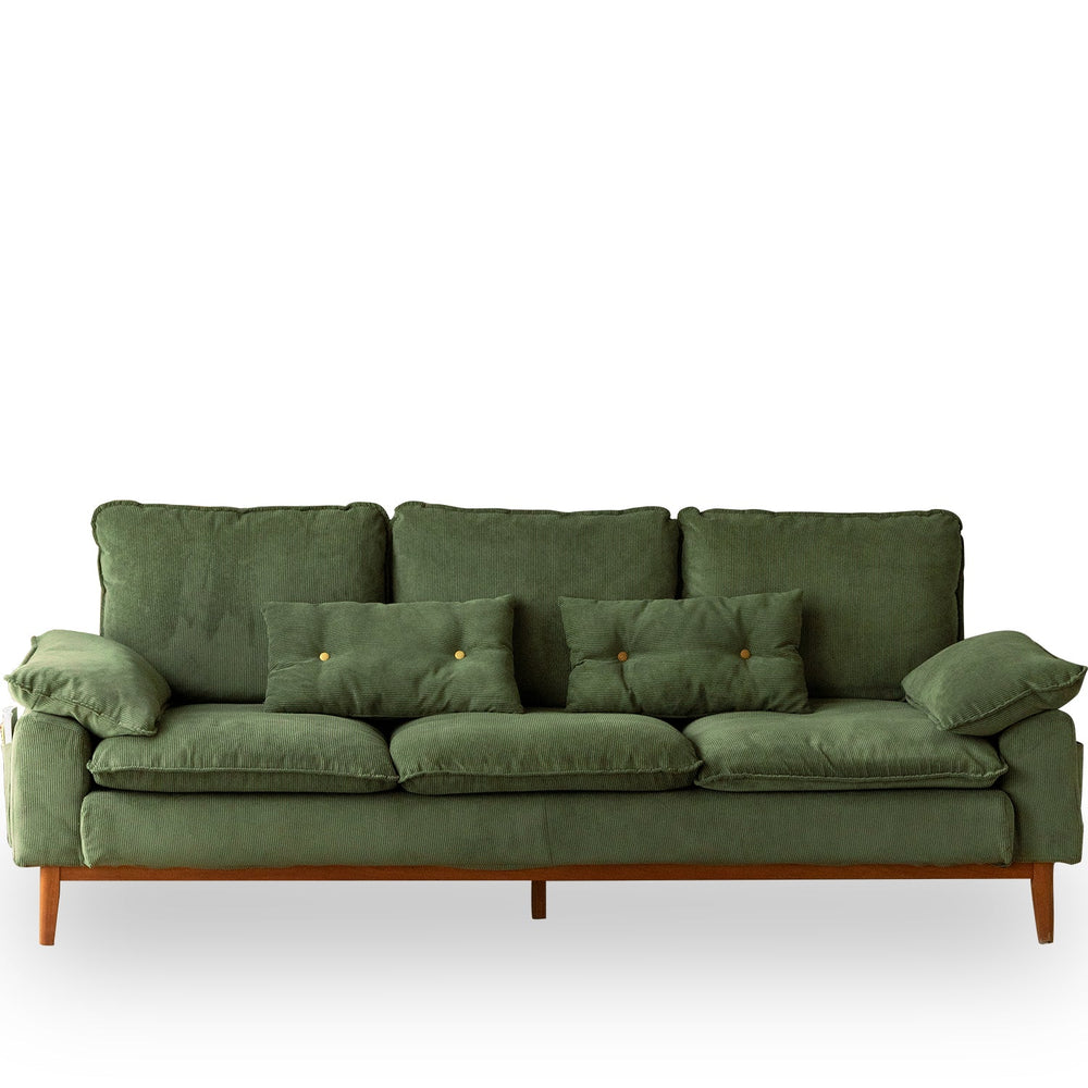 Scandinavian corduroy velvet fabric 3 seater sofa indigo in white background.