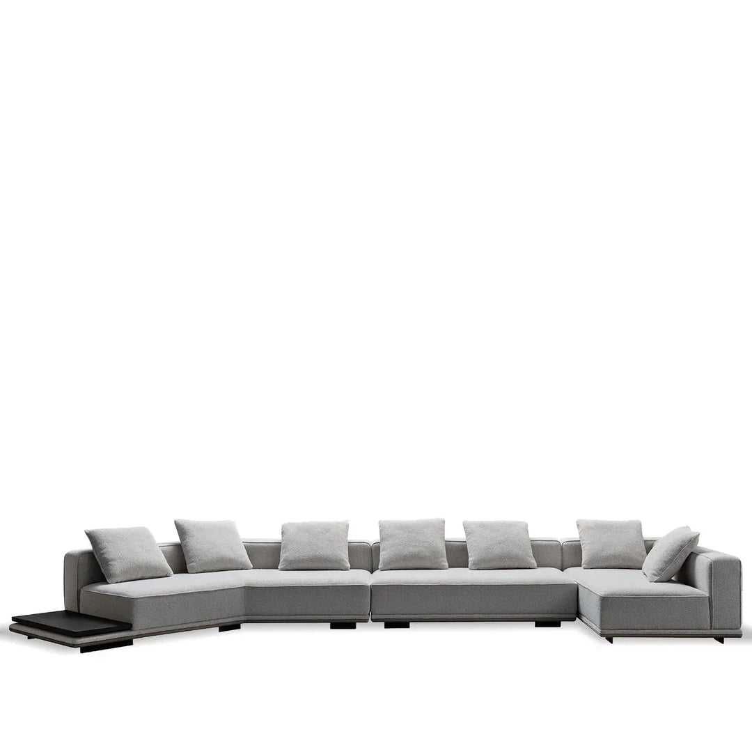 Minimalist mixed weave fabric modular l shape sectional sofa eleganza 7+l in still life.