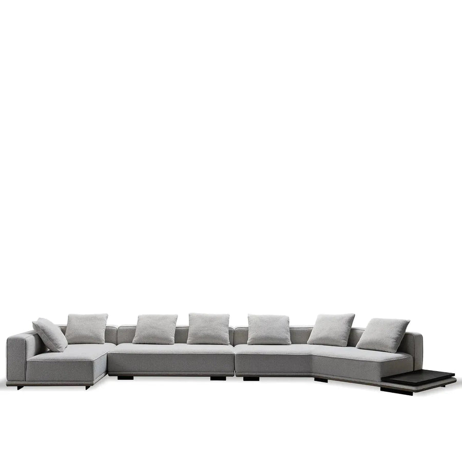 Minimalist mixed weave fabric modular l shape sectional sofa eleganza 7+l in white background.